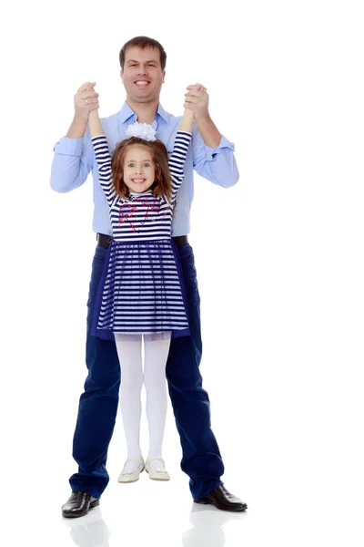 Dad holding daughters hands. — Stock Photo, Image