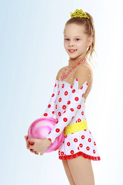 Gymnast does exercises with a ball — Stock Photo, Image