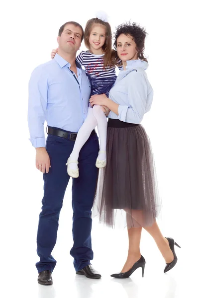 Happy parents with a small daughter. — Stock Photo, Image