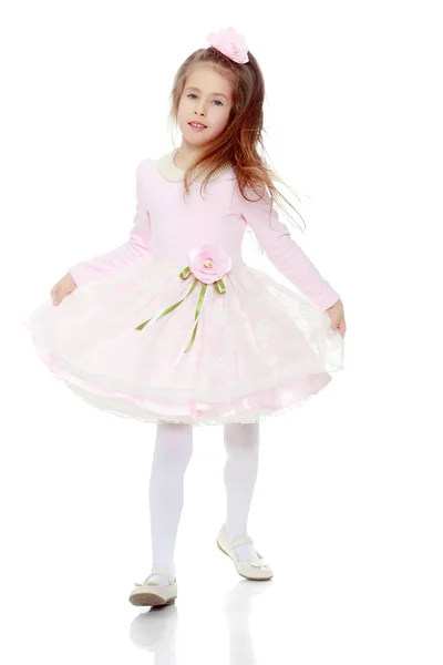 Elegant little girl in a pink dress. — Stock Photo, Image