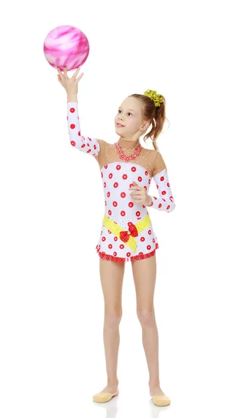 Gymnast does exercises with a ball — Stock Photo, Image