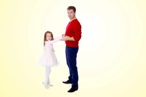 Little girl pulls her hands to his daddy. — Stock Photo, Image