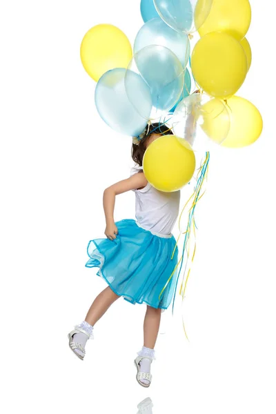 Menina com balões multicoloridos . — Fotografia de Stock