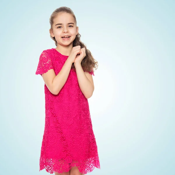 Hermosa niña en un vestido rojo . — Foto de Stock