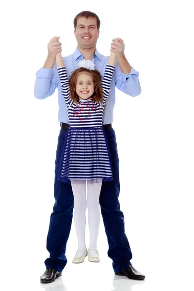 Dad holding daughters hands. — Stock Photo, Image