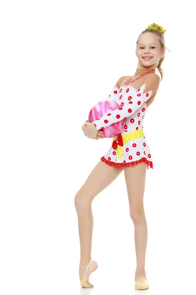 Gymnast does exercises with a ball — Stock Photo, Image