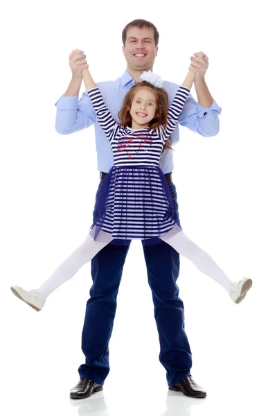 Dad holding daughters hands. — Stock Photo, Image