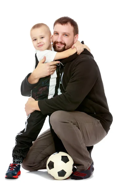 Boy, a dad, and a soccer ball. — Stock Photo, Image