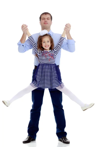 Dad holding daughters hands. — Stock Photo, Image