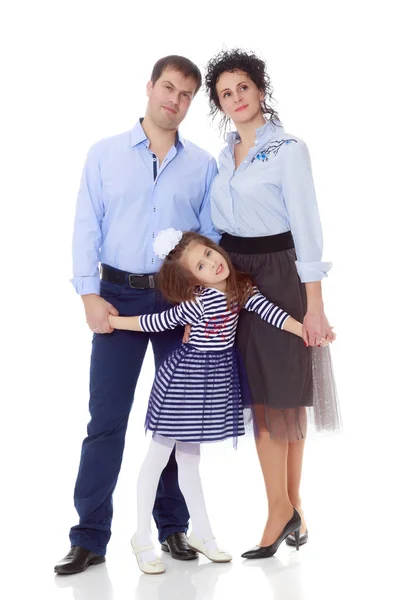 Happy parents with a small daughter. Royalty Free Stock Photos