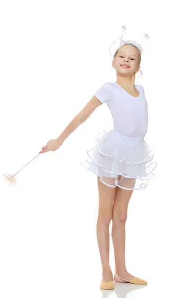 Girl gymnast with a magic wand in his hand. — Stock Photo, Image