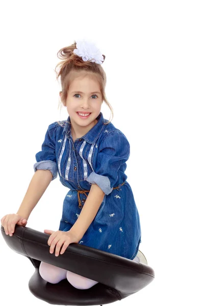 The little girl in the blue dress. — Stock Photo, Image