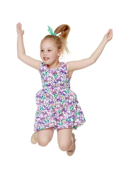 Little girl is jumping. — Stock Photo, Image