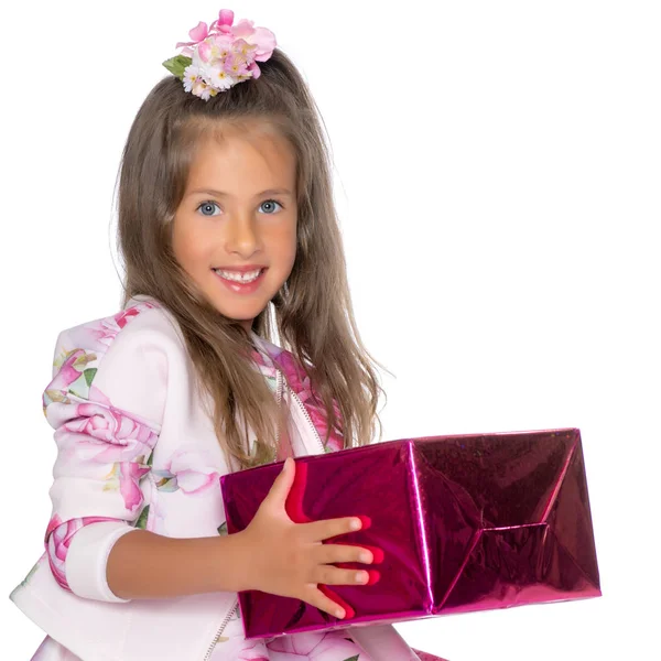 Little girl with a gift — Stock Photo, Image