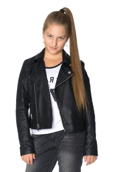 A teenage girl in a leather jacket and jeans. — Stock Photo, Image