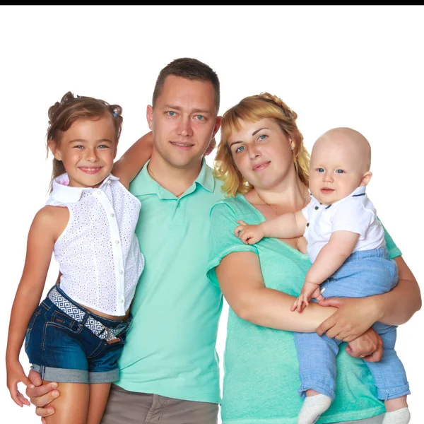Familia feliz con niños pequeños —  Fotos de Stock