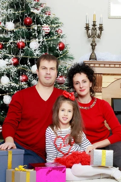 The young family celebrates New year. — Stock Photo, Image