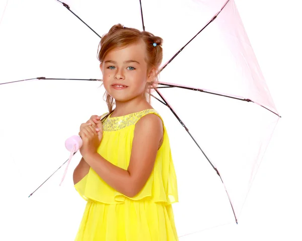 Little girl under an umbrella. — Stock Photo, Image