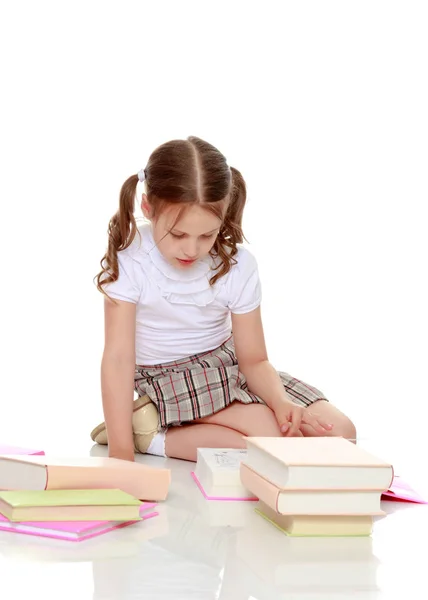 Little girl with a book Stock Image