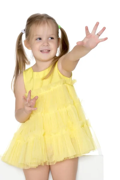 Fashionable little girl in a dress — Stock Photo, Image