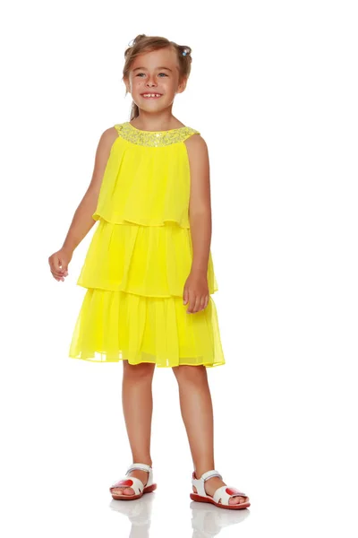 Fashionable little girl in a dress — Stock Photo, Image