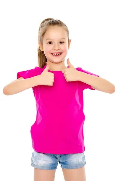 Little girl holding her thumb up — Stock Photo, Image