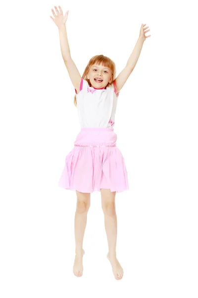Little girl is jumping. Stock Picture
