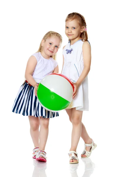 Two little girls play ball. — Stock Photo, Image