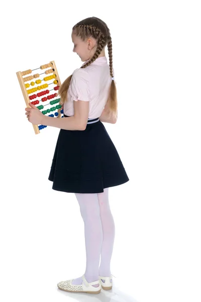 The girl counts on abacus — Stock Photo, Image