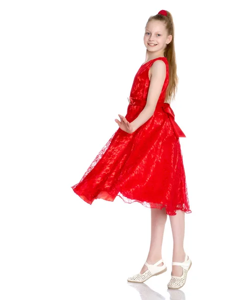 Elegant girl in a dress. — Stock Photo, Image