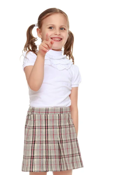 Dziewczynka wskazuje palcem — Zdjęcie stockowe