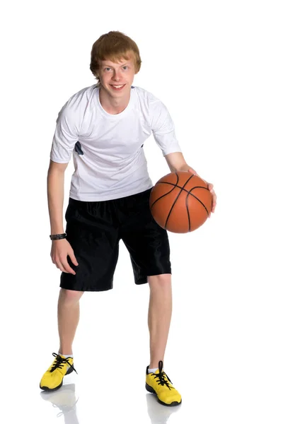 Bem feito cara com uma bola para o basquete — Fotografia de Stock