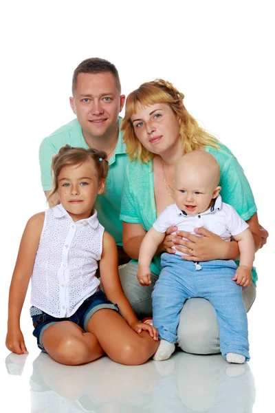 Happy family with young children — Stock Photo, Image