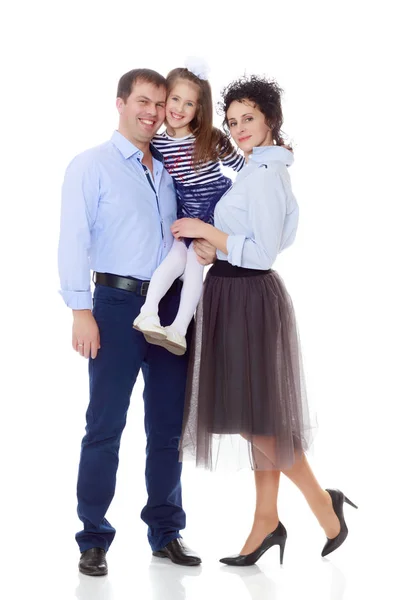 Happy parents with a small daughter. — Stock Photo, Image