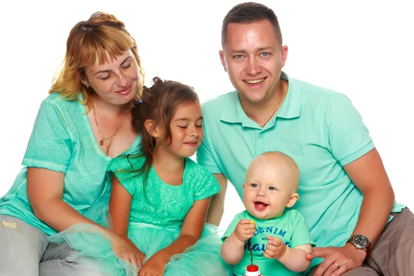 Happy family with young children — Stock Photo, Image