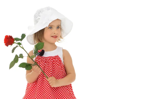 Bambina con un mazzo di fiori — Foto Stock