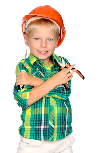Il bambino col casco del costruttore . — Foto Stock