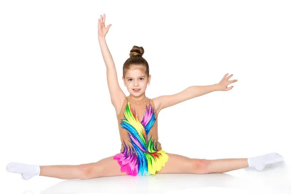 Girl gymnast perform the twine exercise. — Stock Photo, Image