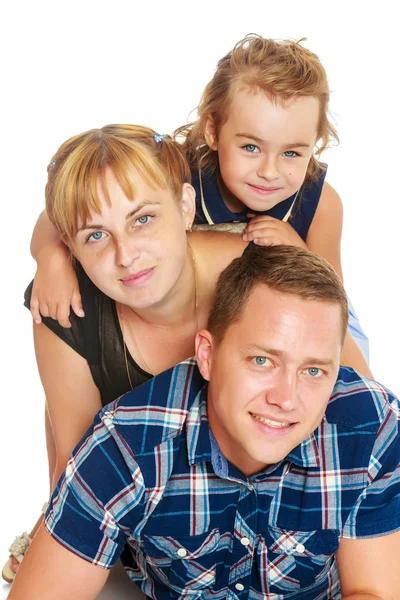 Mother and daughter sitting on dads back. Stock Photo