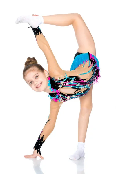 La gimnasta se equilibra en una pierna . —  Fotos de Stock