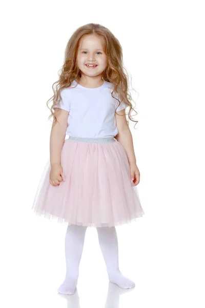 Fashionabla liten flicka i klänning — Stockfoto