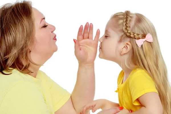 Mom and little daughter plus the size of the model, gently embra — Stock Photo, Image