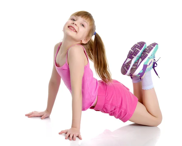 The gymnast perform an acrobatic element on the floor. — Stock Photo, Image