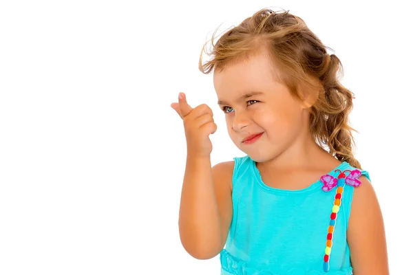 Little girl is showing a finger — Stock Photo, Image