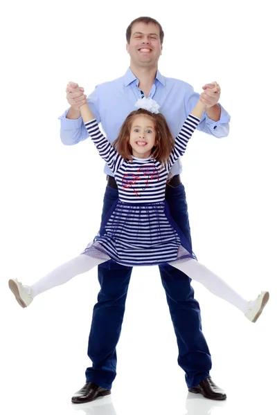 Dad holding daughters hands. — Stock Photo, Image