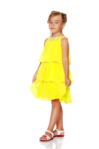 Fashionable little girl in a dress — Stock Photo, Image