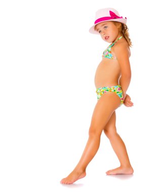 Bir küçük tabaklanmış kız bir mayo ve bir şapka.