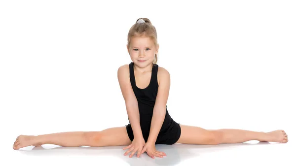 Flicka gymnast utföra garnträning. — Stockfoto