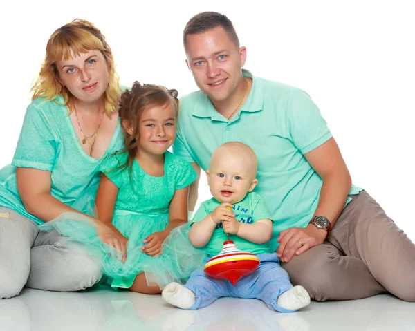 Happy family with young children — Stock Photo, Image