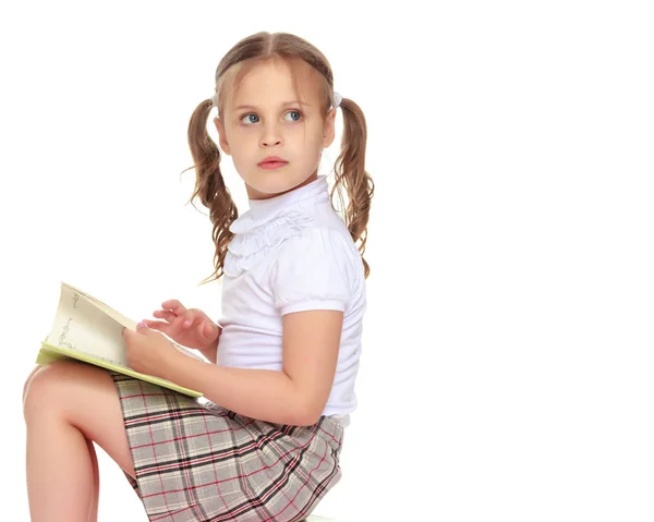 Little girl with a book — Stock Photo, Image